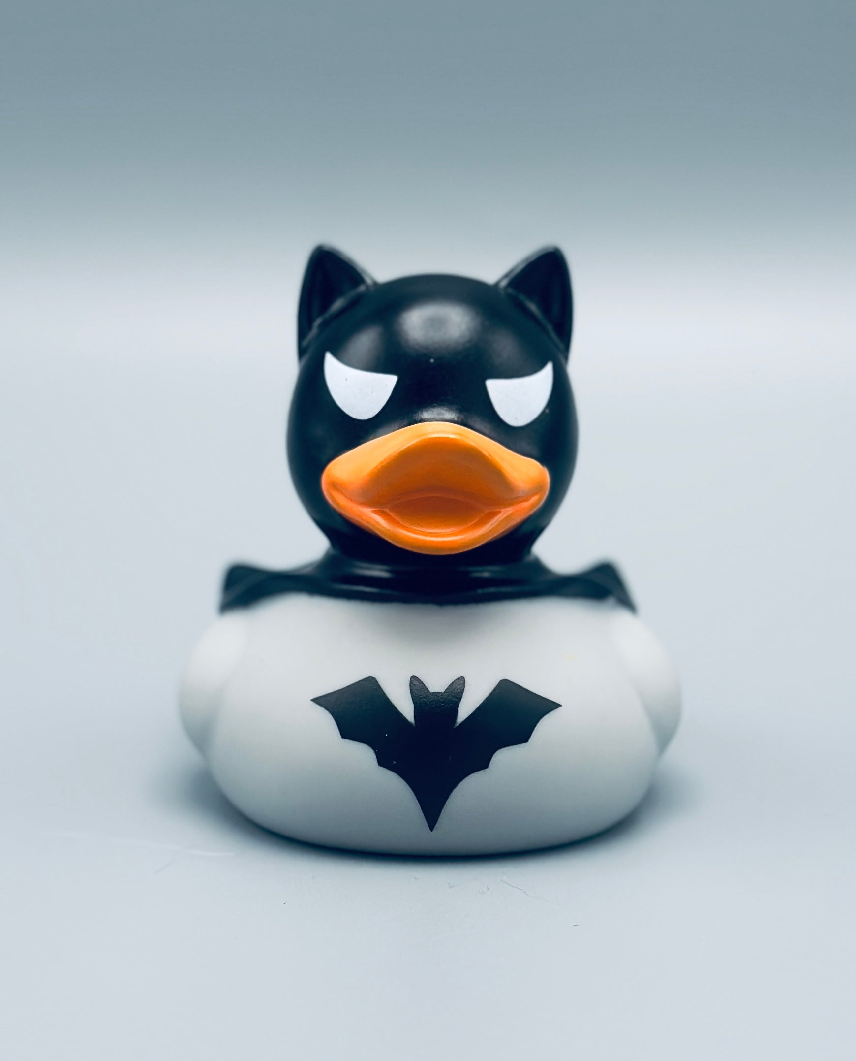 Rubber duck with batman logo on a white background